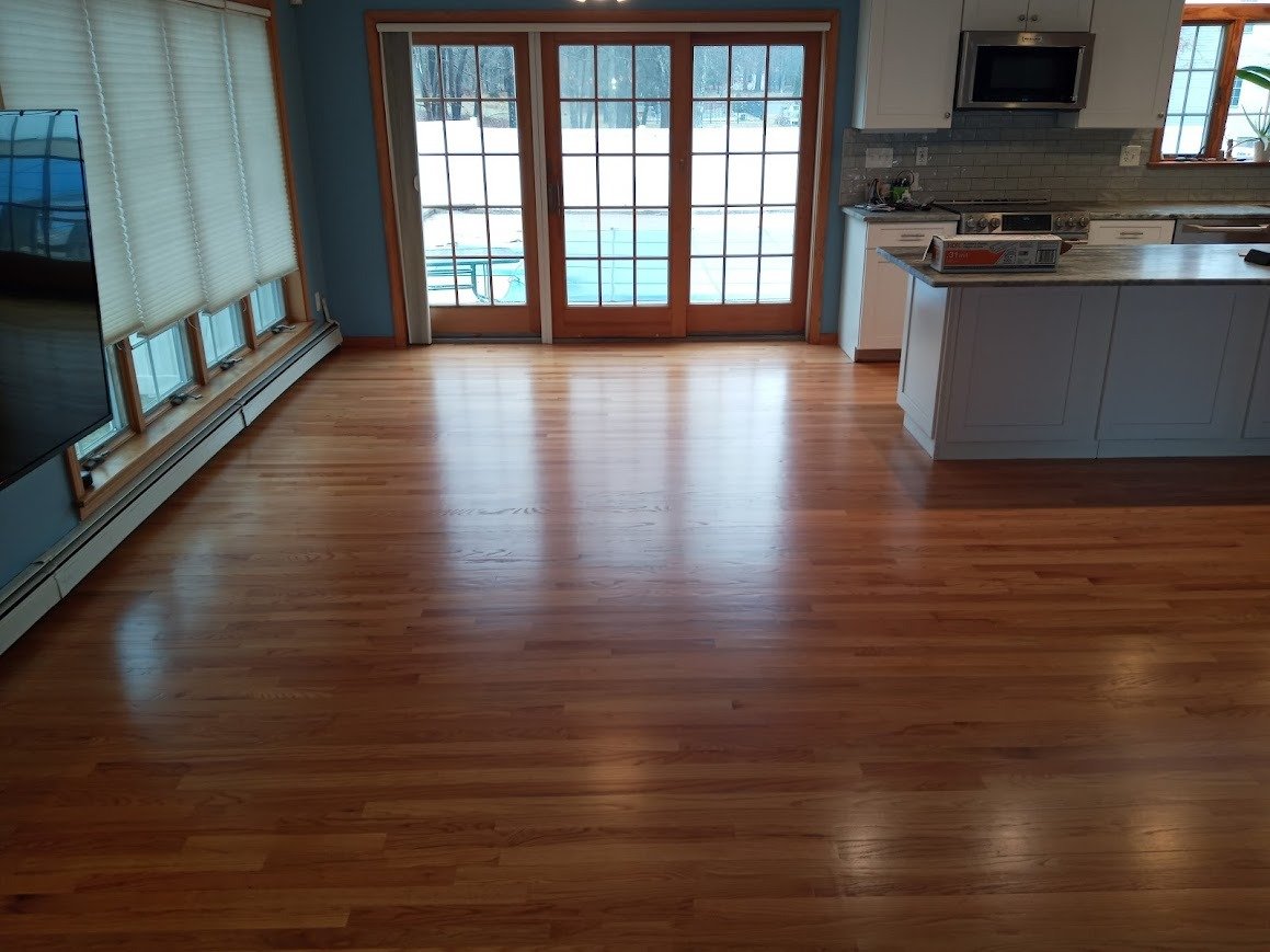 Wood floor restoration result after sanding and finish work