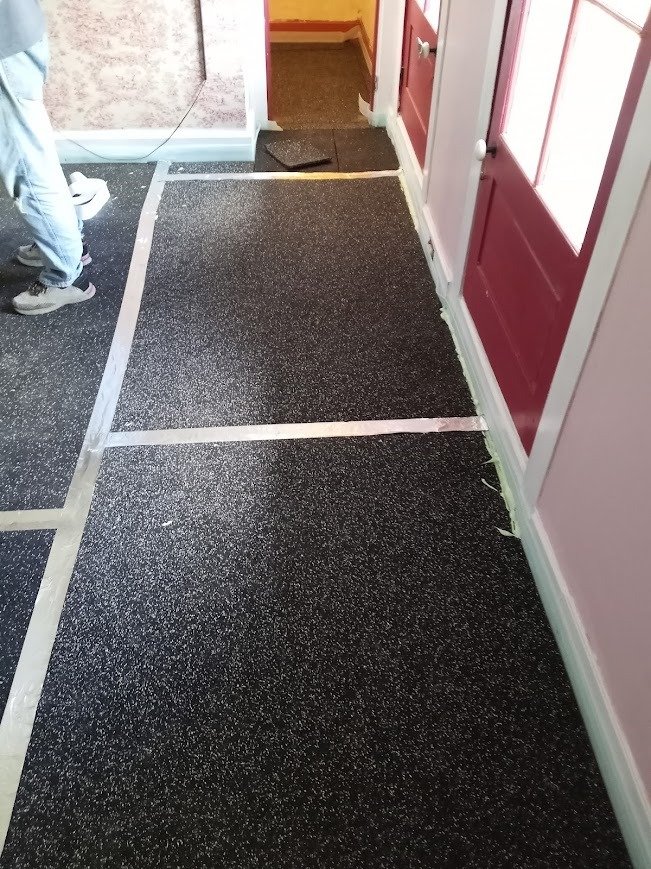 Hardwood floor installation project in progress
