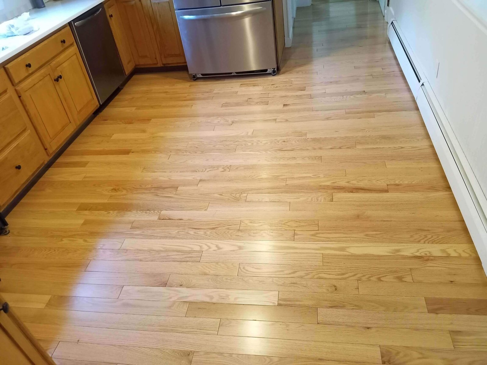 Luxury vinyl plank flooring installed in a kitchen